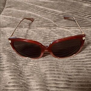 Elegant Red Sunglasses by Coach